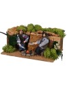 Two men in movement at the bivouac with working fire effect 12