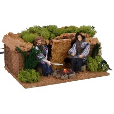 Due uomini in movimento al bivacco con effetto fuoco