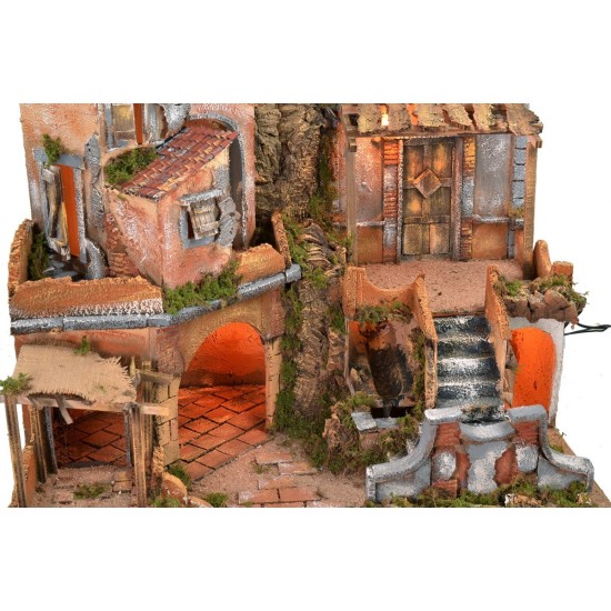 Presepe illuminato con cascata funzionante cm 60x45x61 h Mondo