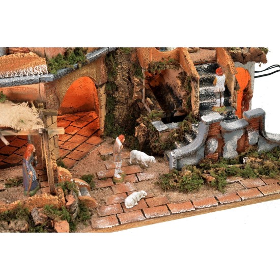 Illuminated nativity scene with functioning waterfall complete with statues