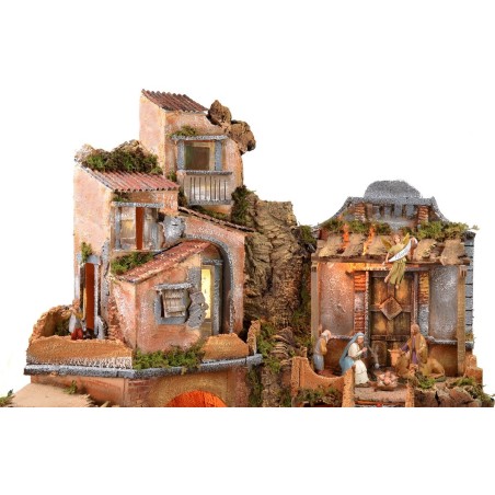 Presepe illuminato con cascata funzionante completo di statue