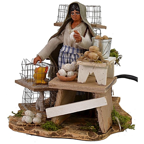 Vendedora de huevos en movimiento h 12 cm estatua, huevos, corriente