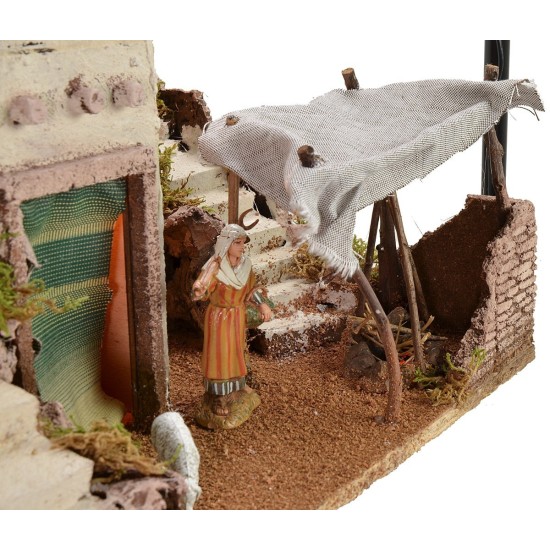 Illuminated Arab nativity scene with functioning bivouac