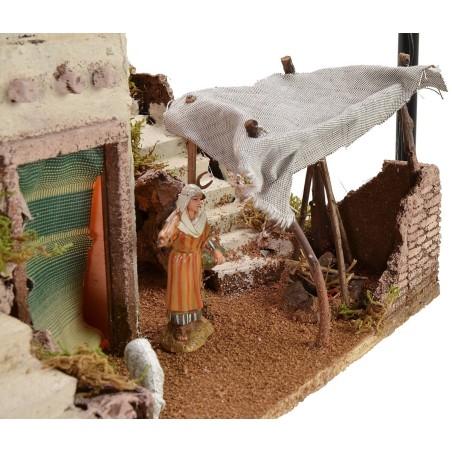 Illuminated Arab nativity scene with functioning bivouac