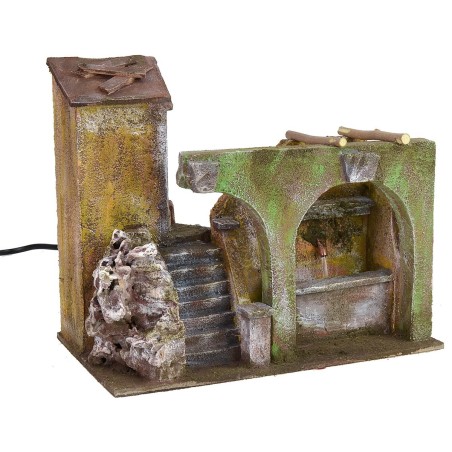 Portion of home with functioning fountain and arcs for presepe