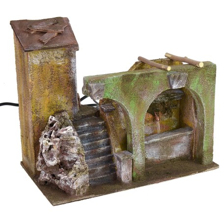 Portion of home with functioning fountain and arcs for presepe