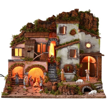 Illuminated nativity scene with functioning fountain complete with statues