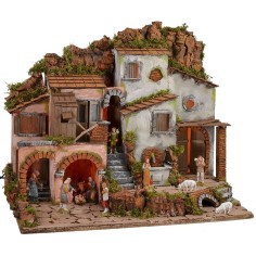 Illuminated nativity scene with functioning fountain complete with statues