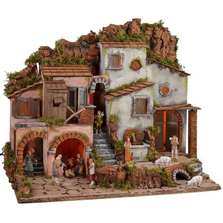 Belén iluminado con fuente funcional completo con estatuas.