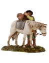 Hombre que ensilla el caballo escena 10 cm Landi Moranduzzo