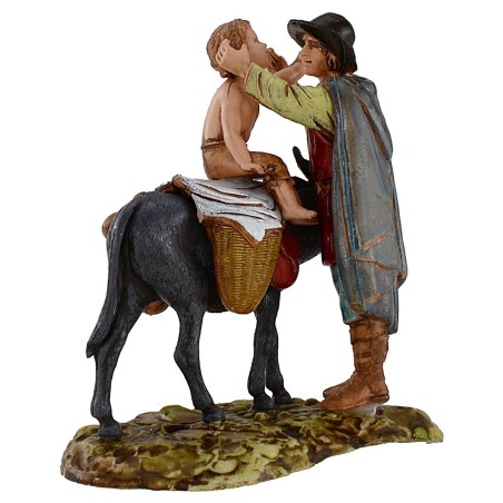 Hombre de pie y niño sobre burro 10 cm Landi Moranduzzo