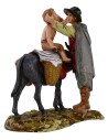 Hombre de pie y niño sobre burro 10 cm Landi Moranduzzo
