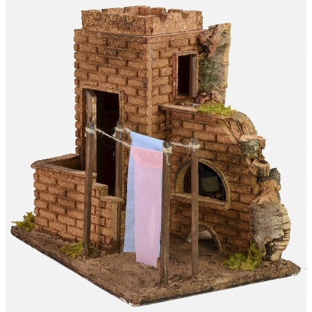 House with clothes hanging wind effect cm 27x19x24,5 h.