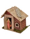 Donna che esce e apre la porta serie Landi 10 cm Mondo Presepi