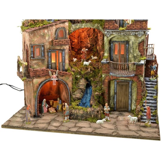 18th century style illuminated nativity scene with waterfall, complete with statues