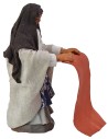 Woman beating clothes 10 cm