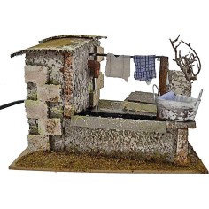 Stenditoio gocciolante con fontana presepe cm 20x14x13 h. -