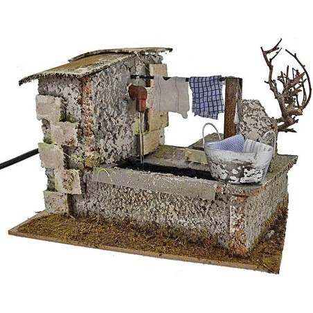 Stenditoio gocciolante con fontana presepe cm 20x14x13 h. -