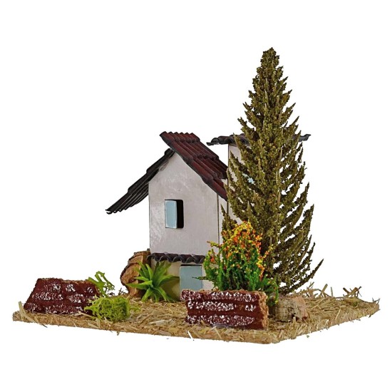 Casas para belén con árbol de 13,5x13,5x9 cm de altura.