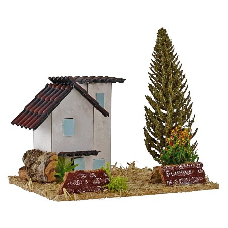 Casas para belén con árbol de 13,5x13,5x9 cm de altura.