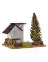 Casas para belén con árbol de 13,5x13,5x9 cm de altura.