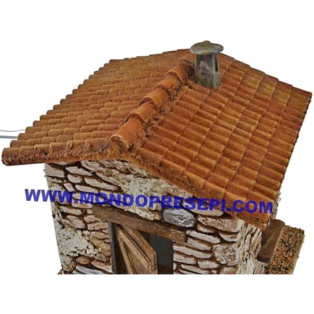 Casa de piedra con humo cm 15x12x19 h. Mundo Pesebres