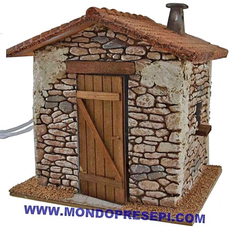 Casa de piedra con humo de 25x22x24 cm h. Mundo Pesebre.
