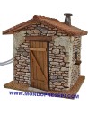 Casa de piedra con humo de 25x22x24 cm h. Mundo Pesebre.