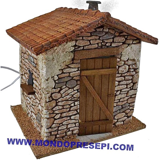 Casa de piedra con humo de 25x22x24 cm h. Mundo Pesebre.