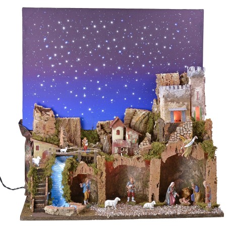 Illuminated nativity scene with a starry sky made of fiber