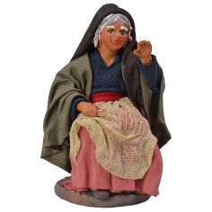 Mujer sentada que dialoga serie12 cm altura, tejido, mujer