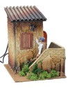 Double movement illuminated house with man ringing the bell and