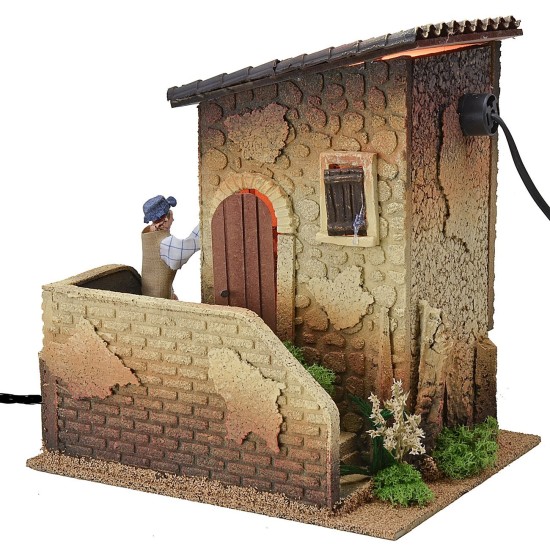 Casa iluminada con doble movimiento con hombre que toca la