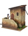 Double movement illuminated house with man ringing the bell and