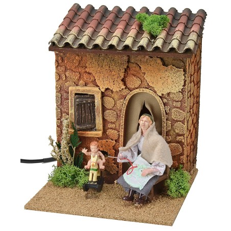 Woman embroidering and child on double rocking horse