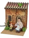 Woman embroidering and child on rocking horse with double