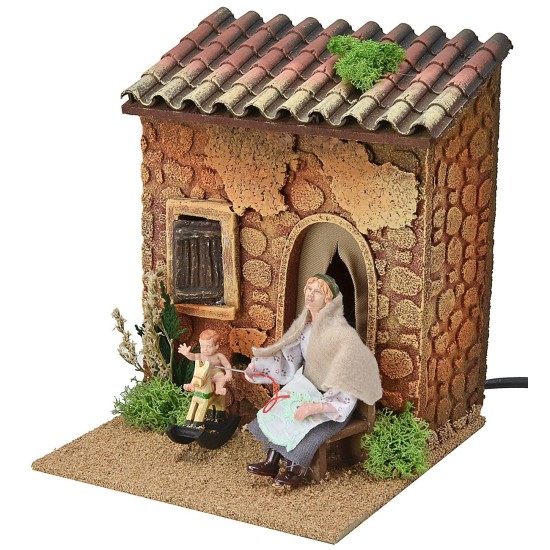 Woman embroidering and child on double rocking horse