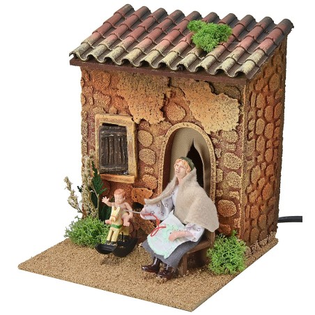 Woman embroidering and child on double rocking horse