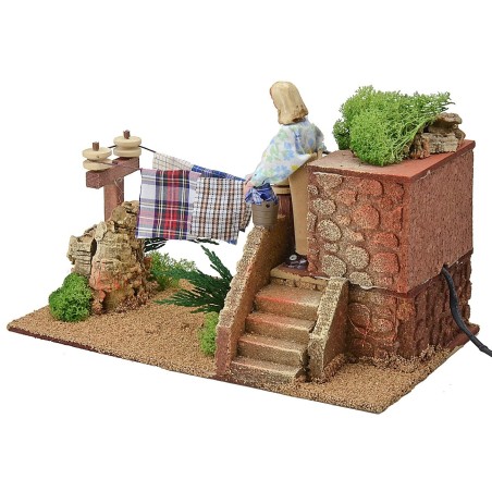 Donna 12 cm che stende i panni cm 15x26x18 h Mondo Presepi
