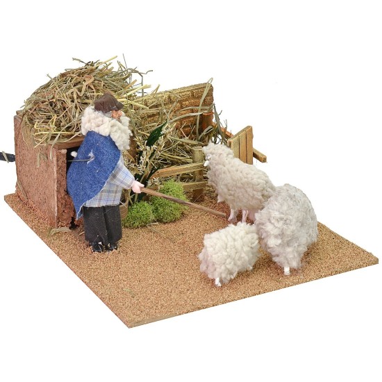 Shepherd 12 cm at the sheepfold in motion 19x23x13 h