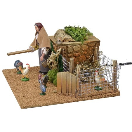 Donna 12 cm al pollaio in movimento cm 20x20x13 h Mondo Presepi
