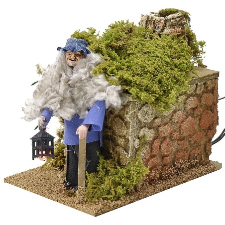 Pastor de 12 cm en movimiento con linterna iluminada de 10x14x13 cm.