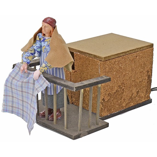 Woman 12 cm on the balcony flapping clothes in motion cm