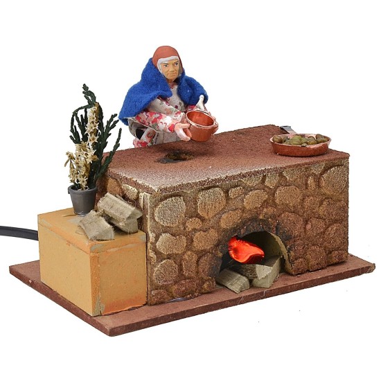 Mujer cocinando en movimiento 16x10x12 h Mundo Pesebre