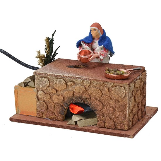 Donna che cucina in movimento 16x10x12 h