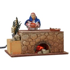 Donna che cucina in movimento 16x10x12 h