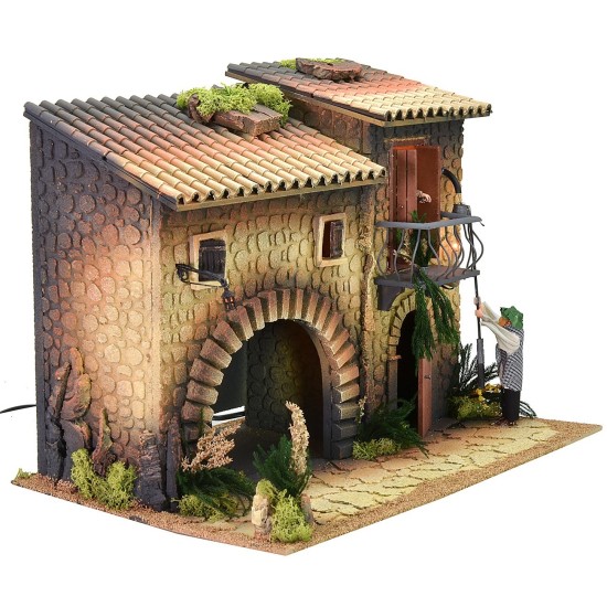 Illuminated house with moving lamplighter 12 cm and woman who