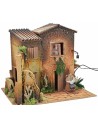 Illuminated village with two women 12 cm in movement cm
