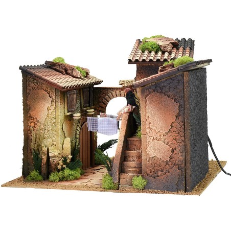 Borgo con mujer de 12 cm en el balcón que tiende la ropa en