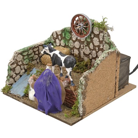 Mungitrice seduta in movimento serie 10 cm Mondo Presepi